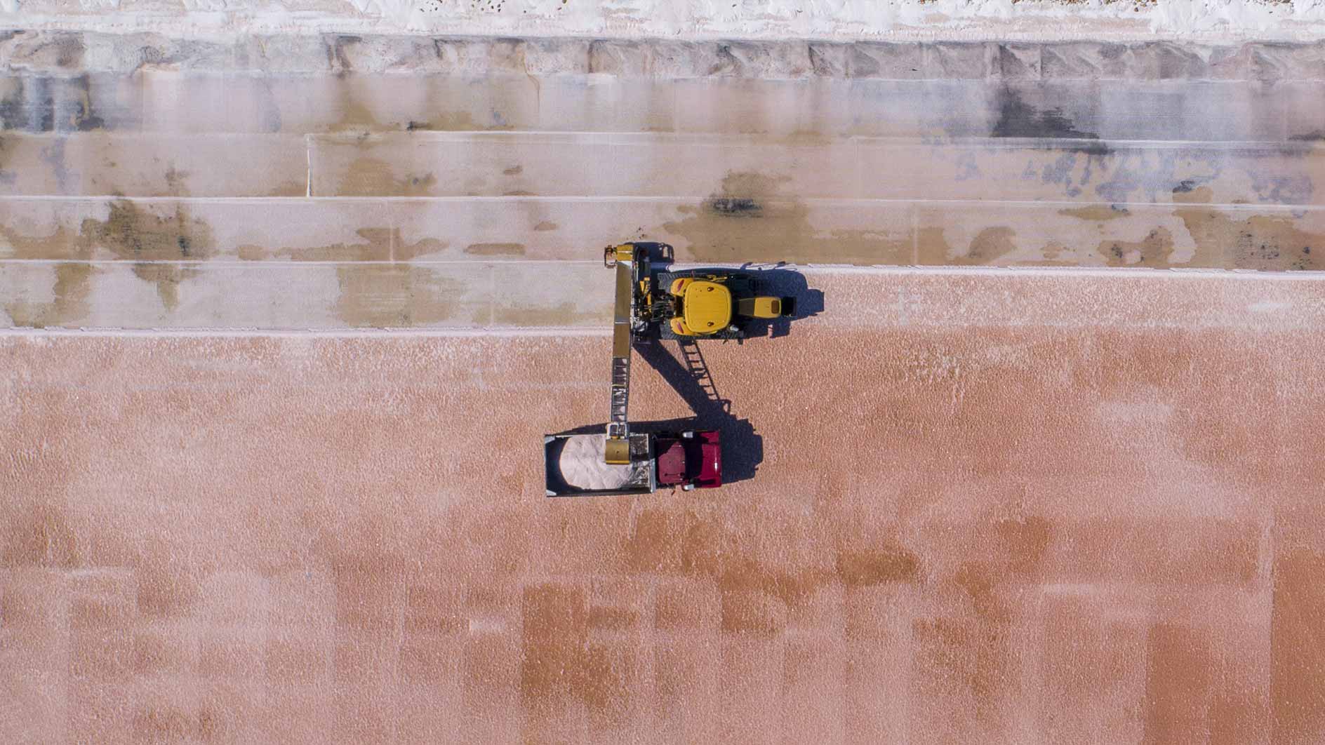 Aerial view of salt pond and machinery